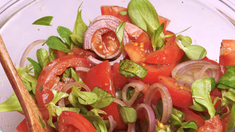 juicy tomato salad in a salad bowl