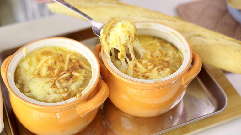 cheesy stringy hot onion soup deeply caramelized